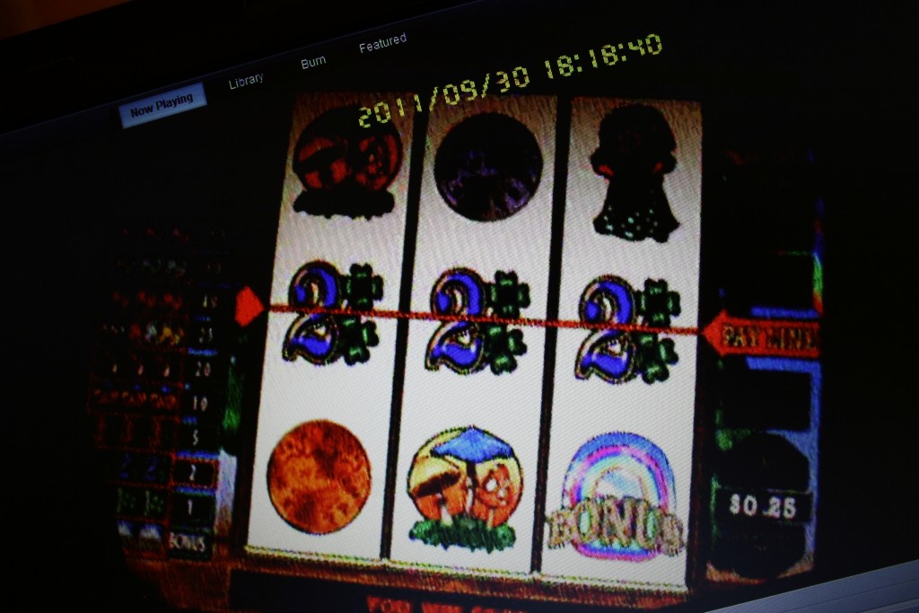 093011 LLCS  gambling machine line up horiz